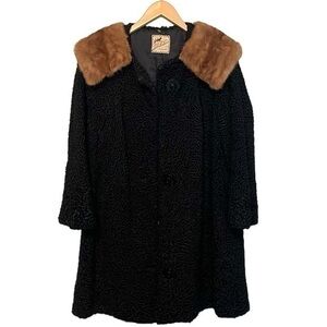 Tibbetts Furs Women’s Coat Black with Tan Fur fits like an XL